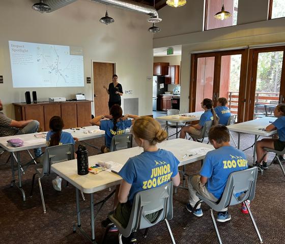 Palmer staff presenting to a group of junior zoo keepers.