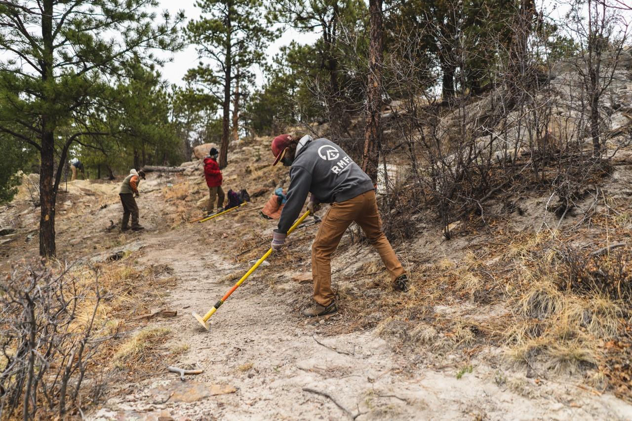 people building trail